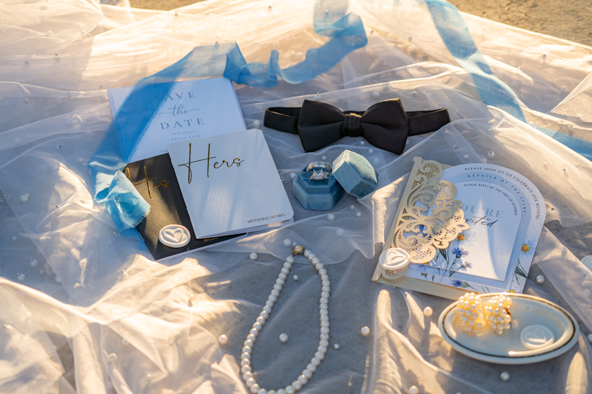 Wedding details photographed at sunset with soft golden light during an Orange County wedding.